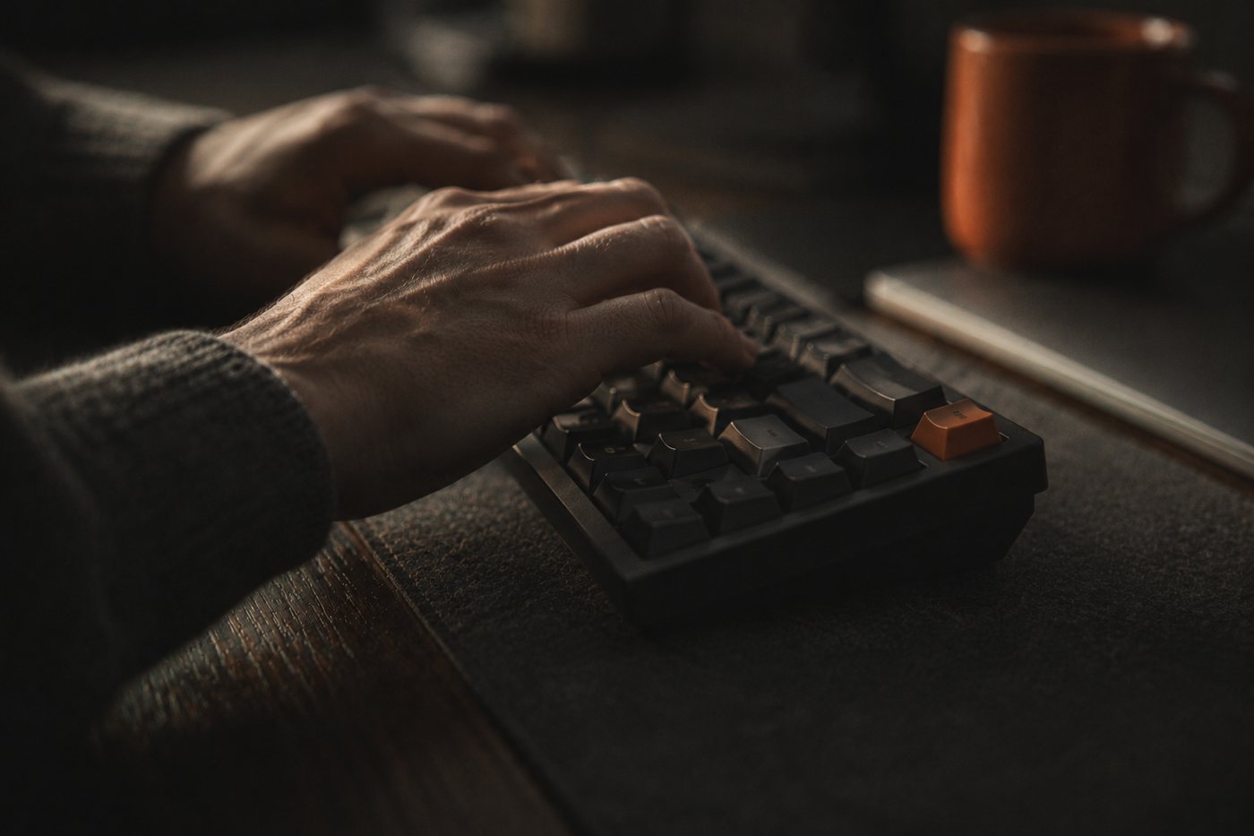 Working at a keyboard in evening light
